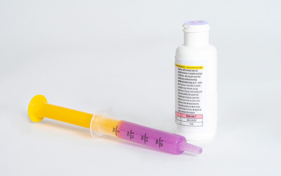 Photo of pediatric medicine and dosing syringe.